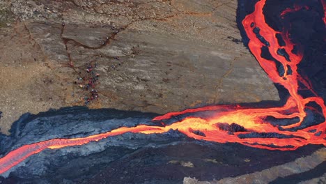 Texture-Of-Flowing-Lava,-Volcano-Eruption-at-Fagradalsfjall,-Iceland---aerial-drone-shot