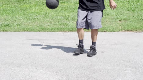 Unseen-Man-Dribbling-Behind-the-Back-Solo-Practice-Fitness-Outside-Playing-Ball-in-Backyard-Park