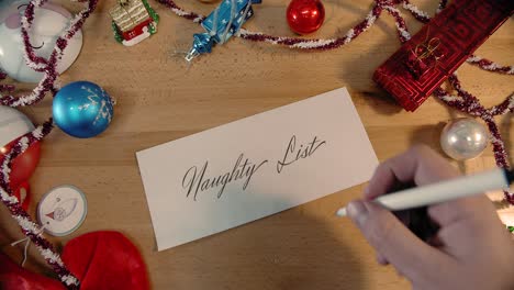 Handwritten-Christmas-letter-that-says-Naughty