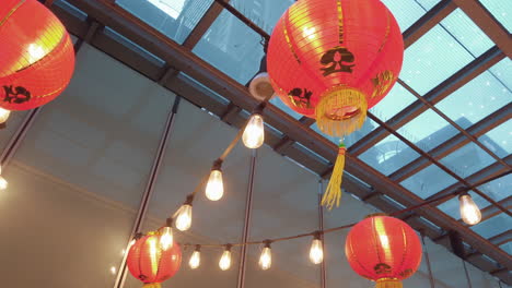 Beautiful-Chinese-Lanterns-Decoration-For-Lunar-New-Year-With-Plastic-Roof-On-The-Background