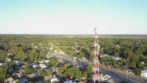 Aerial-View-of-Modern-Suburbia-With-Communication-TV-and-Mobile-Networks-Tower,-San-Jose-Del-Ricon,-Santa-Fe,-Argentina