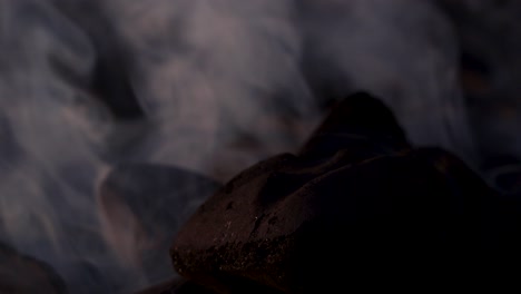 Charcoal-grill-smoldering-close-up-on-the-smoke