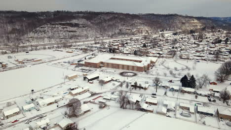 Aerial-drone-view-of-Ironton,-Ohio-and-the-Appalachians-covered-in-snow