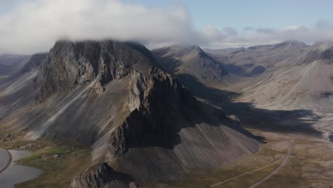 Famous-Iceland-volcanic-mountain-range-at-Hvalnes-peninsula,-aerial