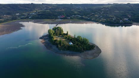 Aerial-View-Of-Aucar-Island-Connected-To-Island-Of-Chiloe-By-Wooden-Walkway