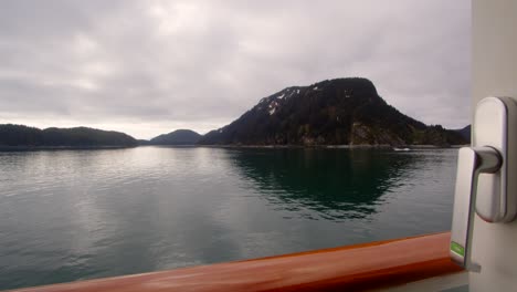 Alaska-Outer-Coast,-Glacier-Bay-National-Park,-Shot-from-cruise-ship-of-Glacier-Bay-with-boat-passing