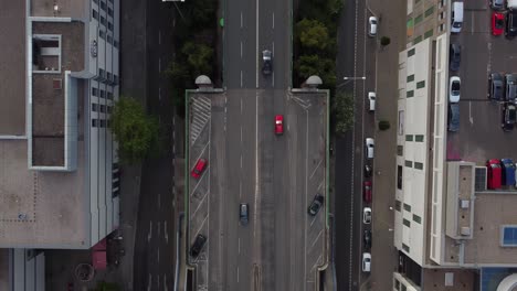 Berlin-2021-4k:-Summertime,-Day-Time-golden-houre:
a-red-car-is-being-tracked-from-above-with-a-drone