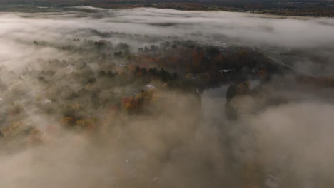 Atmospheric-View-With-Foggy-Clouds-Wrapping-Sherbrooke-Town-During-Autumn-In-Quebec,-Canada