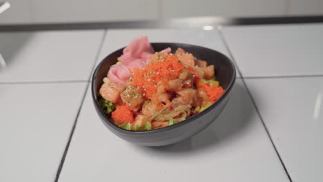 Prepared-Salmon-And-Ahi-Tuna-Poke-Bowl-Topped-With-Sesame-Seeds-And-Tobiko
