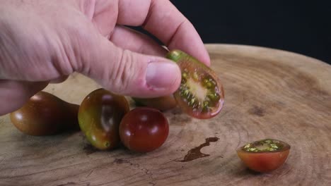 Cutting-Open-a-Chocolate-Pear-Tomato
