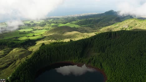 Back-Reveal-fly-over-Canário-Lagoon-reflecting-the-sky-São-Miguel-Azores