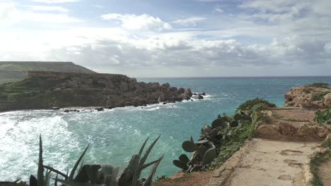Overview-of-Ghajn-Tuffieha-Bay-Beach-on-a-Steep-Hill-During-Winter-in-Malta