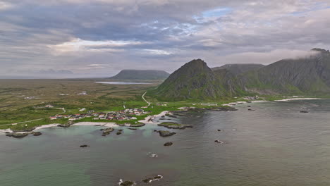 Andenes-Norway-v8-drone-fly-above-andfjorden-capturing-coastal-village-town-towards-camping-ground-surrounded-by-beautiful-nature-landscape-and-mountainscape-view---Shot-with-Mavic-3-Cine---June-2022