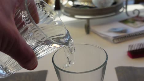 two-glasses-of-water-in-slowmotion
