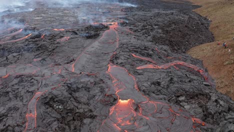Aerial-View-Of-Lava-Flowing-From-Erupted-Fagradalsfjall-Volcano-In-Reykjanes-Peninsula,-South-Iceland