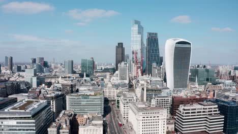 Descending-drone-shot-from-City-of-London-skyscrapers-to-London-bridge