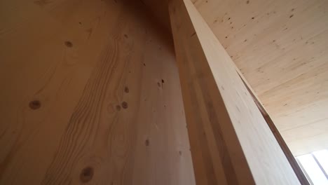 Detail-of-wooden-walls-made-of-striped-board-in-a-construction-site-with-camera-movement