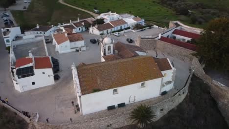 Aerial-Circle-Pan,-Orbit,-Over-the-beautiful-and-old-Cacela-Velha-Church