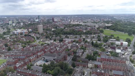 High-aerial-pass-above-Leeds-City-and-residential-areas