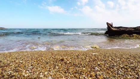 Timelapse-of-waves-lapping-the-beach-at-El-Perelló,-Catalonia
