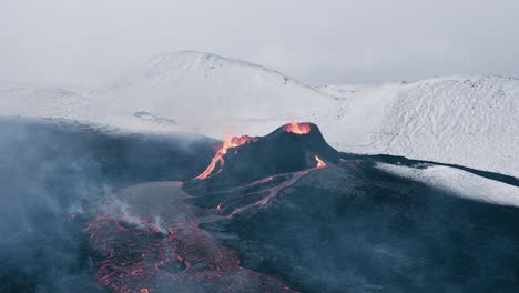 Incredible-scene-of-volcano-eruption-in-arctic-Iceland-landscape,-aerial