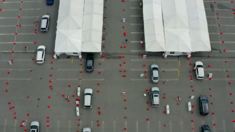 Aerial-4K-footage-of-drive-through-COVID-19-testing-facility-in-Inglewood-by-Chase-Forum,-Los-Angeles,-California,-USA