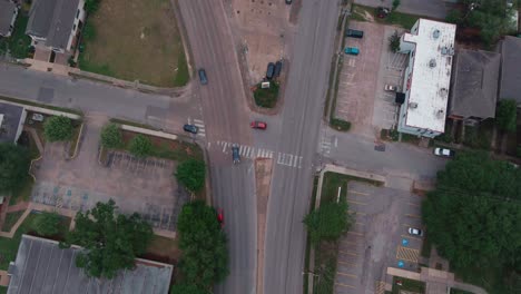 Aerial-of-cars-driving-on-city-street-in-Houston,-Texas