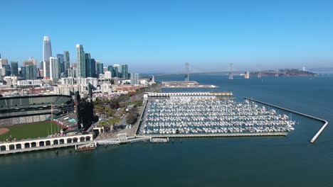 Aerial-view-of-ATT-Oracle-Park-Baseball-stadium,-Bay-Bridge-and-downtown-San-Francisco-shot-in-4k-high-resolution