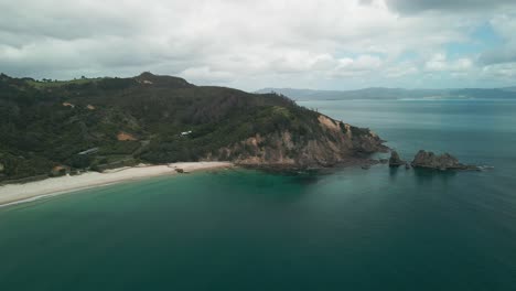 Scenic-viewpoint-flying-high-over-Otama-beach-in-New-Zealand