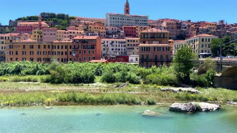 Ventimiglia-Resort-Town-With-Roya-River-and-Road-Bridge-In-Imperia,-Italy