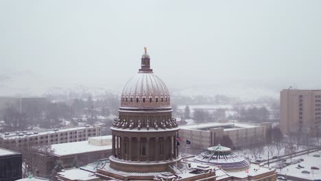 Aerial-view-of-the-government's-capital-building-in-Boise,-Idaho-with-a-blanket-of-fresh-snow