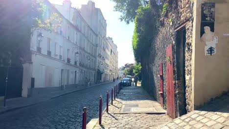 People-Walking-In-The-Street-Of-Montmartre-In-Paris,-France