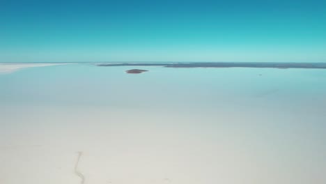 Aerial-wide-view-of-infinity-White-colored-mirror-effect-from-Lake-Gairdner,-Large-Salt-lake,-Australia