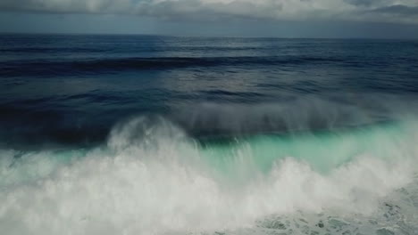 Drone-shot-of-the-waves-on-the-Ocean-in-Madeira