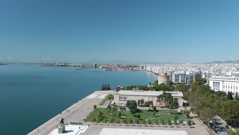 Drone-shot-of-the-beach-and-the-city-in-Thessaloniki