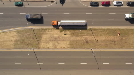 A-top-down-view-directly-over-a-highway-median-on-a-sunny-day