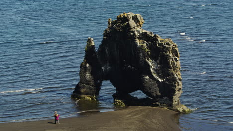 Steady-aerial-drone-view-of-the-Hivitserkur-Basalt-Sea-Stack-in-Iceland