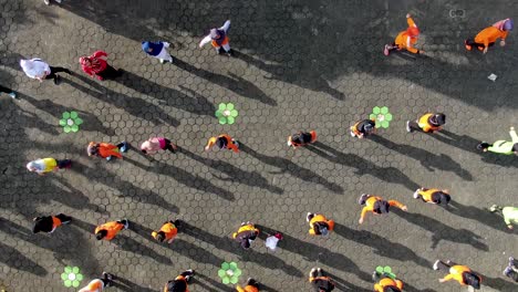 Group-of-people-exercise-in-park,-outdoor-gymnastic-and-aerobic-classes