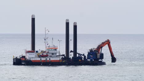 Dredger-in-the-North-Sea-working-outside-Aberdeen's-new-harbour-construction