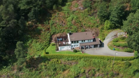 An-aerial-view-of-the-tidy-house-by-the-road