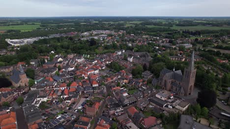 Aerial-panoramic-view-of-historic-Dutch-city-Groenlo-with-church-tower-rising-above-the-authentic-medieval-rooftops