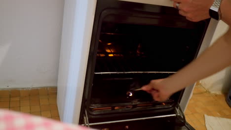 Turning-on-empty-gas-oven-with-matches