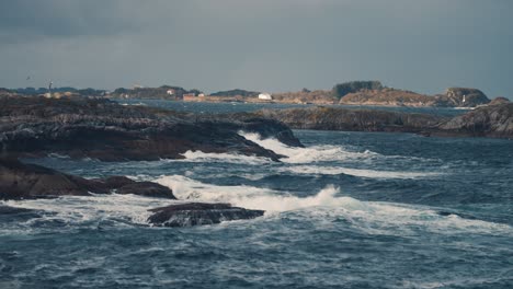 Powerful-waves-are-crashing-on-the-rocky-shores-near-the-Atlantic-road,-in-Norway