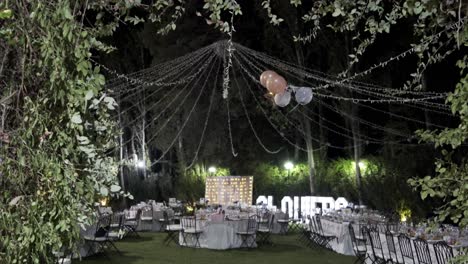 Garden-ready-for-a-banquet-feast-on-a-wedding-night-outdoors