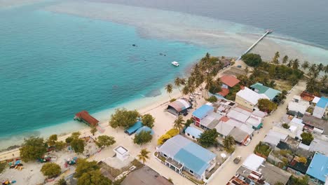 Drone-shots-of-the-Maldivian-island-Thuslusdhoo,-near-the-capital-Male,-Maldives
