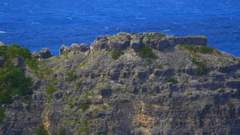 Following-a-ridge-of-a-rocky-seacliff-from-the-eroded-waterline-to-the-green-grassy-top