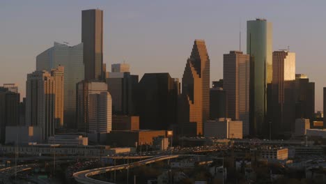 Luftaufnahme-Der-Innenstadt-Von-Houston-Während-Des-Sonnenuntergangs