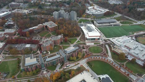 Aerial-View-of-Towson-University-Campus-Maryland-USA,-Buildings-and-Sport-Fields-in-Autumn-Season,-Establishing-Drone-Shot
