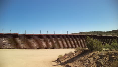 The-US-Mexico-border-fence-in-Jacumba-Hot-Springs,-San-Diego-County,-California,-ground-level