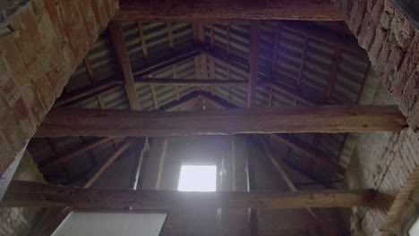 The-interior-of-an-empty-abandoned-brick-barn